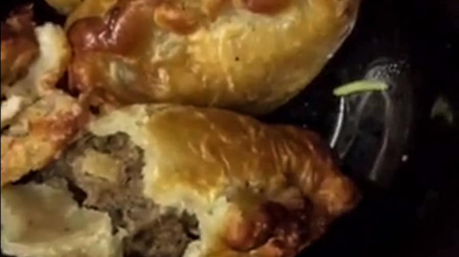 This wriggling bug was found after seven-year-old Kevin Qin bit into his pasty