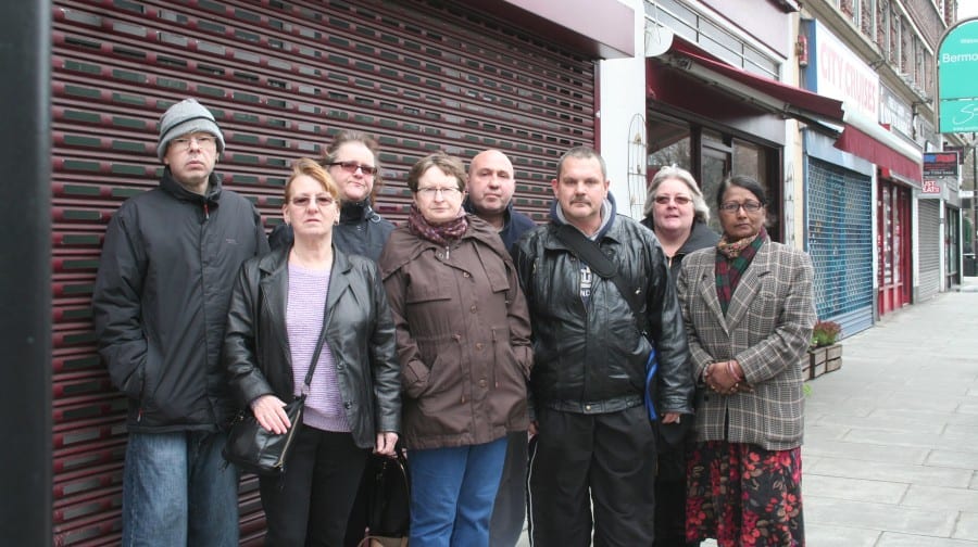 Marie Robertson (second from left) has been taking her son to the Opendoor Resource Centre in Jamaica Road for twenty years, like many of the service users pictured. 
Local Cllr Eliza Mann, far right.