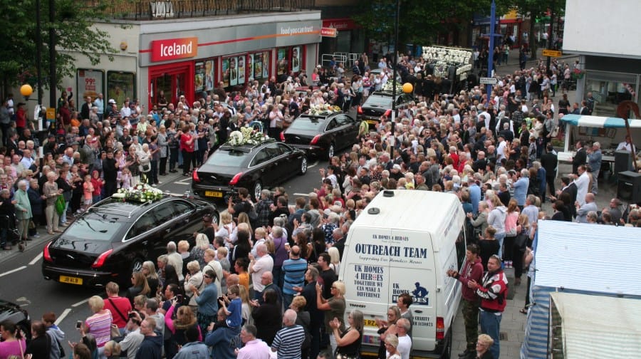 Hundreds gather to pay their respects as Barry Albin-Dyer's funeral cortege passed through the Blue