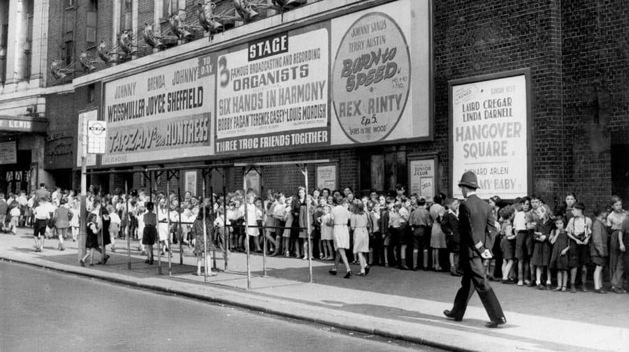 A long queue of children waiting outside the popular Trocadero in the 1940s