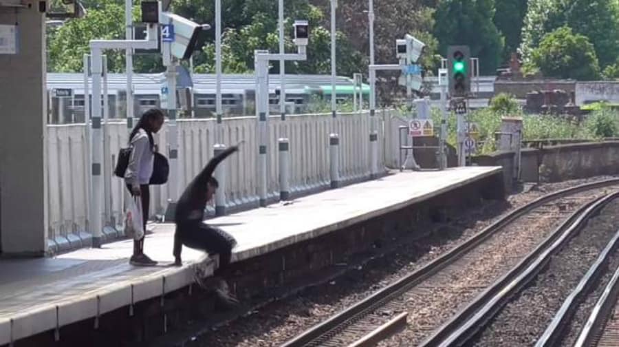 The man captured on a mobile phone jumping on to the tracks at Peckham Rye.
Pic: Evening Standard and Felix Johnson