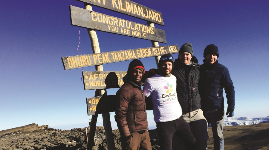 Chris at the top of Kilimanjaro earlier this month