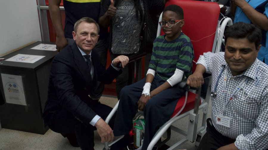 Daniel Craig with patient Aaron Aryitey