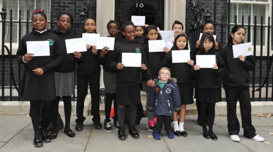Harvey's schoolmates got the Millwall bus to Downing Street to present their letters to the Prime Minister