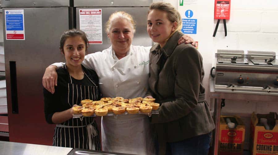 Trainees Ranna Ameer (left) and Shannen Dempsey (right), with tutor Jenny Armstrong (centre)