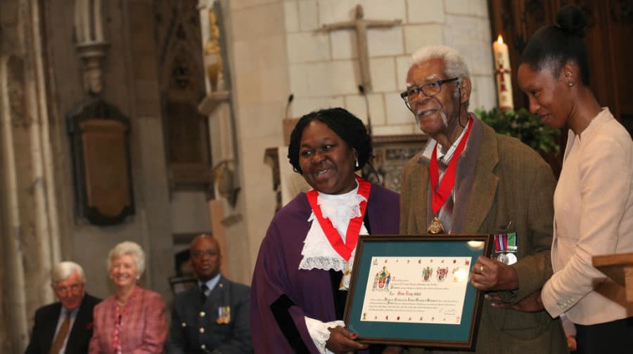 The late Sam King (centre) and Dora Dixon-Fyle and his granddaughter at 2016 Civic Awards ceremony in Southwark Cathedral