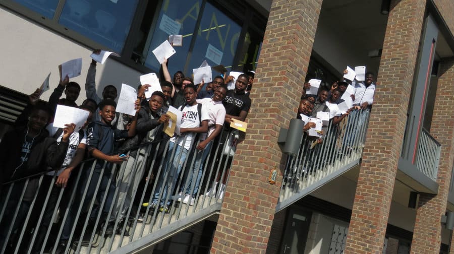 Pupils celebrate their GCSE results at St Thomas the Apostle College in Nunhead