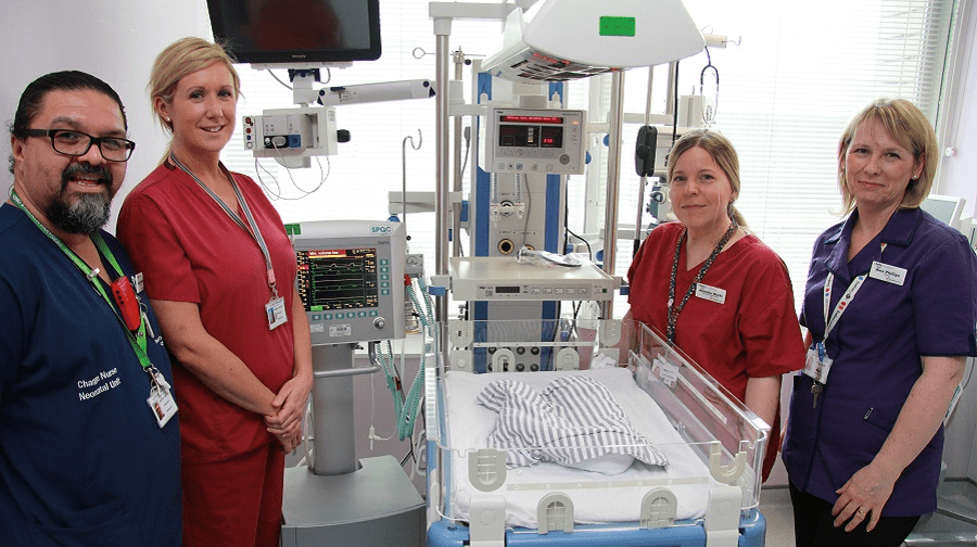 Some of the Evelina London neonatal team alongside equipment they've bought with the generous donations. L-R: Charge nurse Gretton Beaton, Sister Michelle Kirtley, senior staff nurse Jennifer Bhori, and matron Alex Phillips.