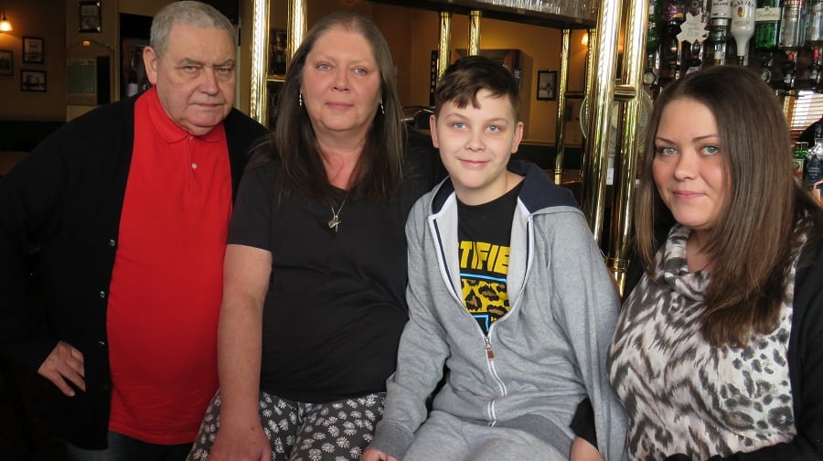 China Hall landlords Michael and Linda Norris pictured with their grandson Luke and daughter Carrie