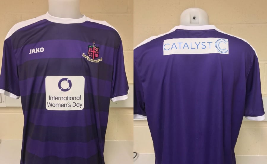 One-off purple kit carrying the logos of IWD's charity partners