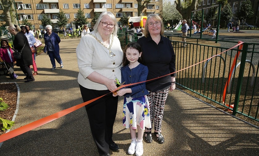 Mayor Kath Whittam cuts ribbon at re-opening of Nelson Square
