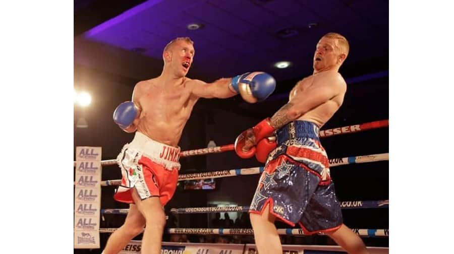 Jimmy Haughney lands a punch on Lee Cannon