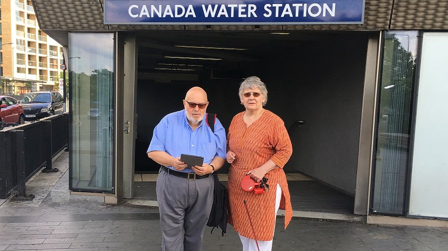 Brian Hodge (vice chair of Canada Water Consultative Forum) with Pauline Adenwalla (chair) outside Canada Water station where some residents go to use the WiFi