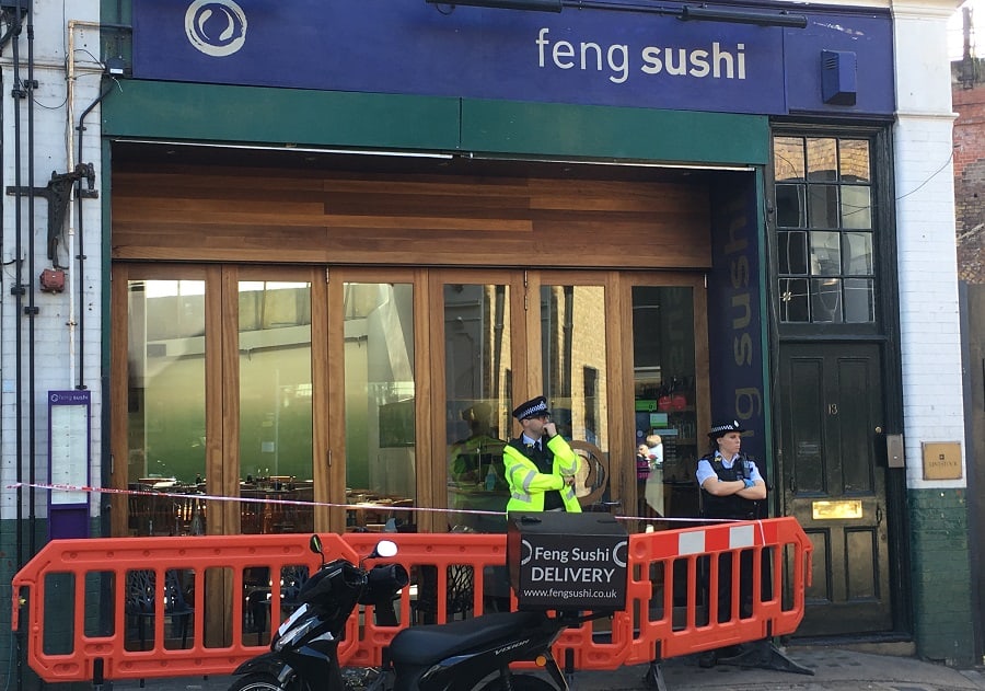 Police cordon in front of Feng Sushi restaurant in Borough Market, after three left injured by "unidentified substance"