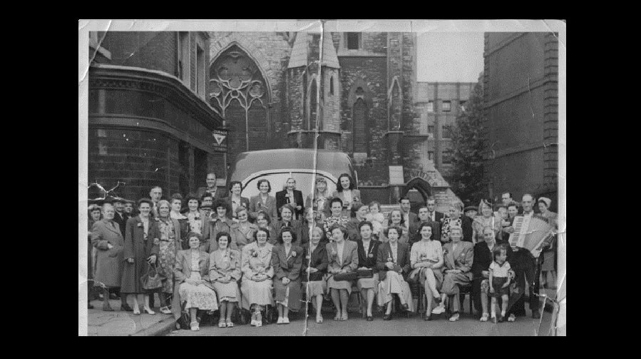 Photo taken in the late 1940s on a pub Beano (day out) in Walworth, before the group travelled to Margate On the back row: the girls’ mum, Margaret, next to daughter Kathleen.
End-right girl on the back row is Eva..