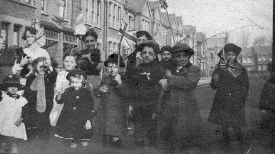 A group of children celebrate the end of the War in Oakbank Grove, Herne Hill