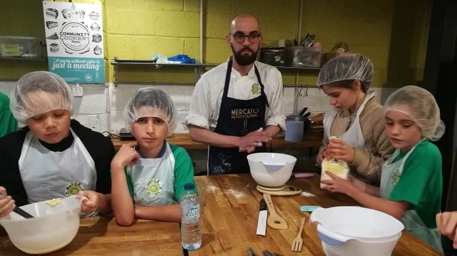 Young Farmers from Surrey Docks made home-grown food for customers in Elephant and Castle with the help of Mercato Metropolitano's chef