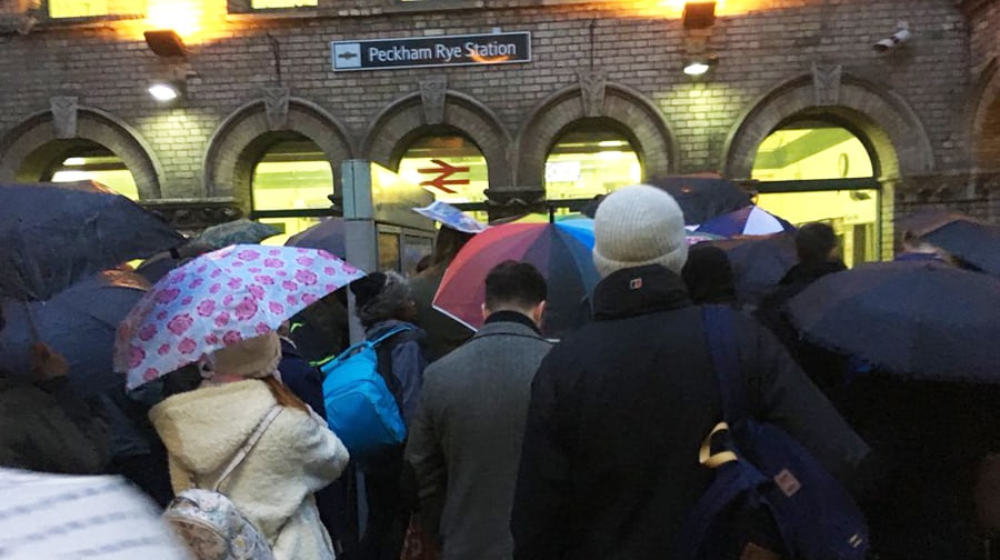 People queuing outside Peckham Rye station, before the COVID-19 pandemic. Photo credit: Craig Thomas.