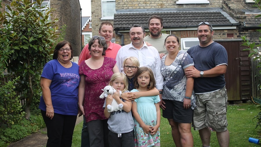 Dave, centre, surrounded by his family and his devoted wife Veronica, far left