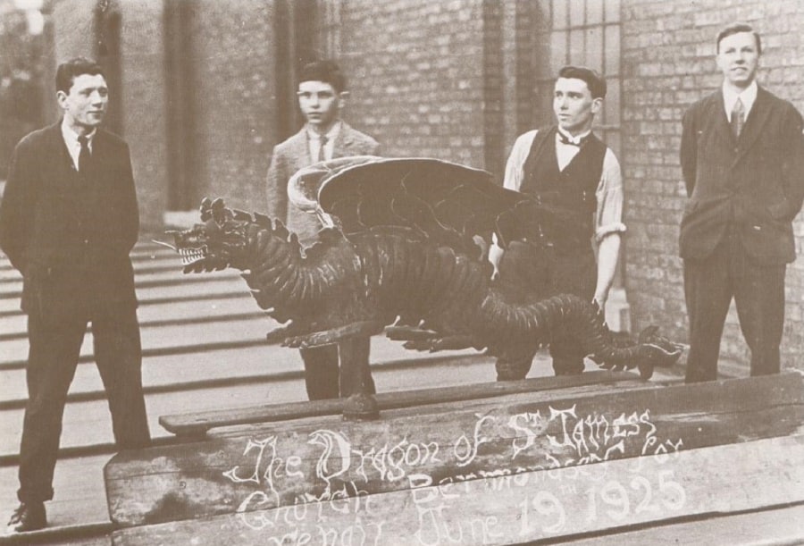 The dragon pictured when it was brought down from the top of St James' in 1925