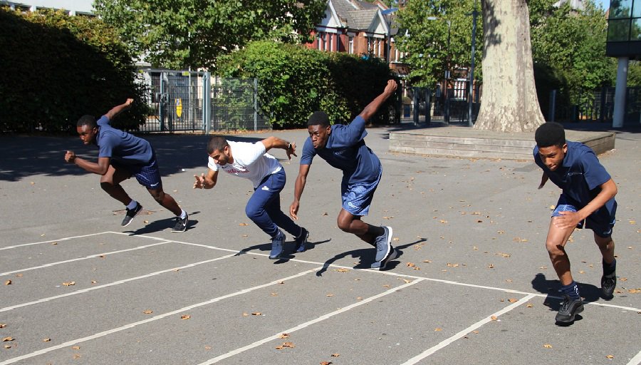 The sprinter races students from Harris Academy