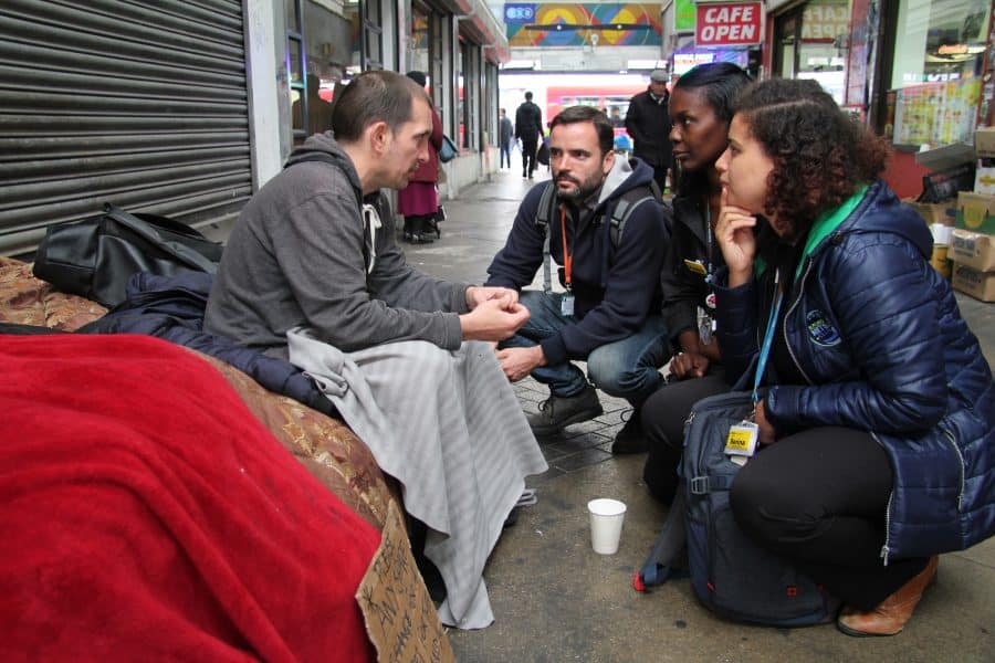 Homelessness nurses Kendra Schneller and Serina Aboim and Street Outreach Worker from St Mungo’s, Graeme Seccombe, with rough sleeper Darren (Image: Maxine Hoeksma)