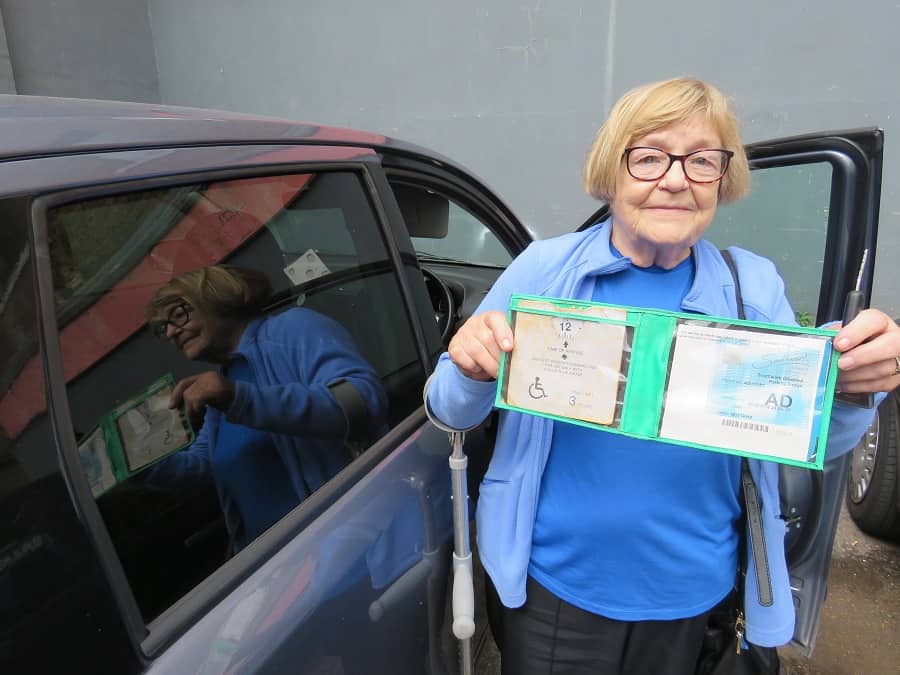 Mrs Grace, with her car and soon-to-be out of date blue badge