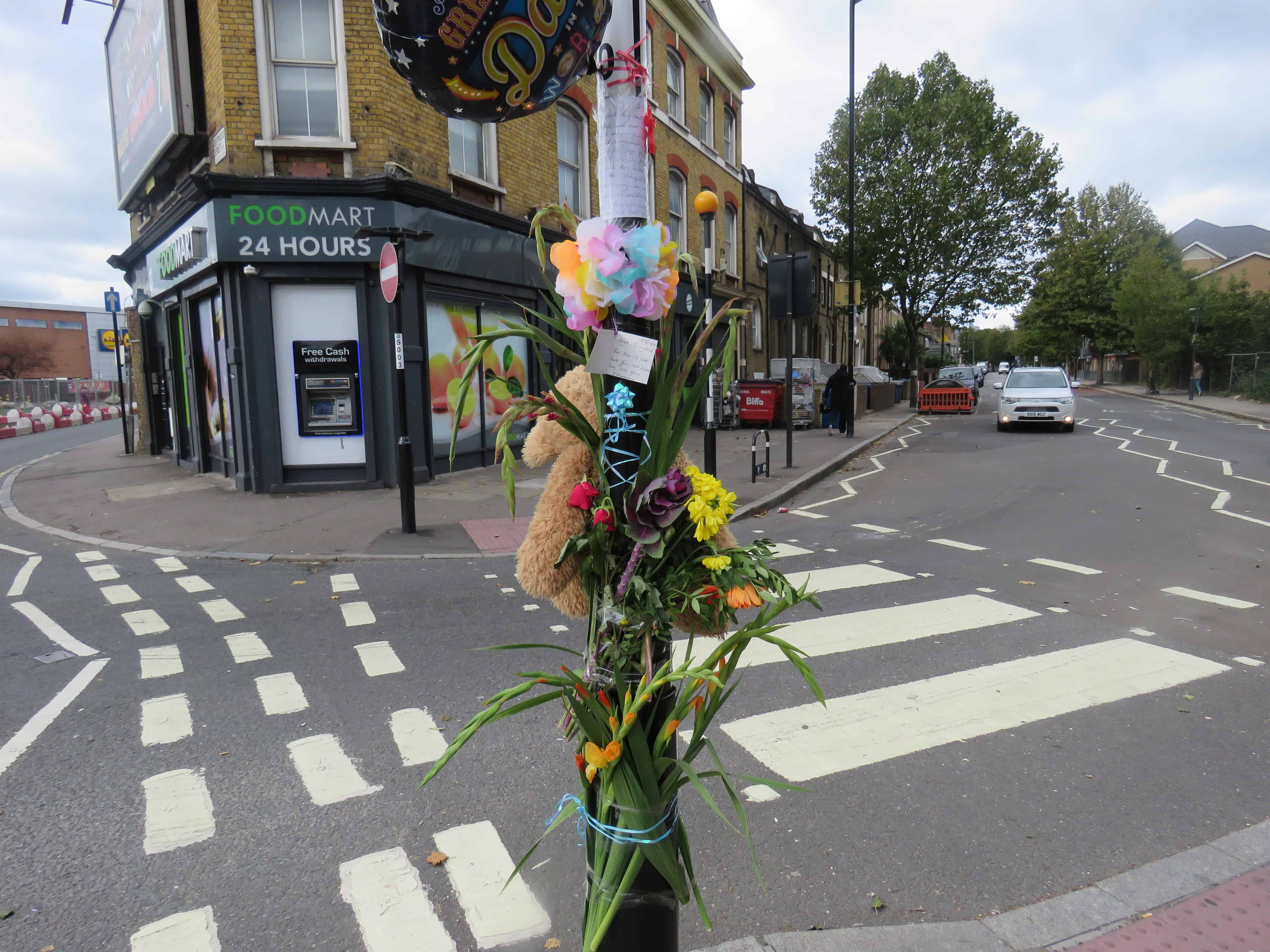 Flowers and notes of condolence have been left at the scene of the collision which claimed the cyclist's life