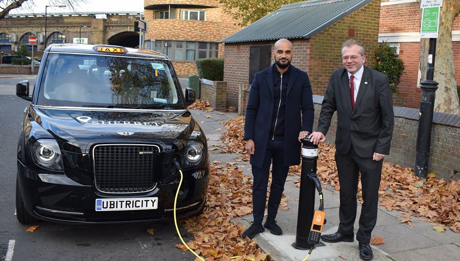 Cabbie Reiss Woodward and Cllr Livingstone with the new charger