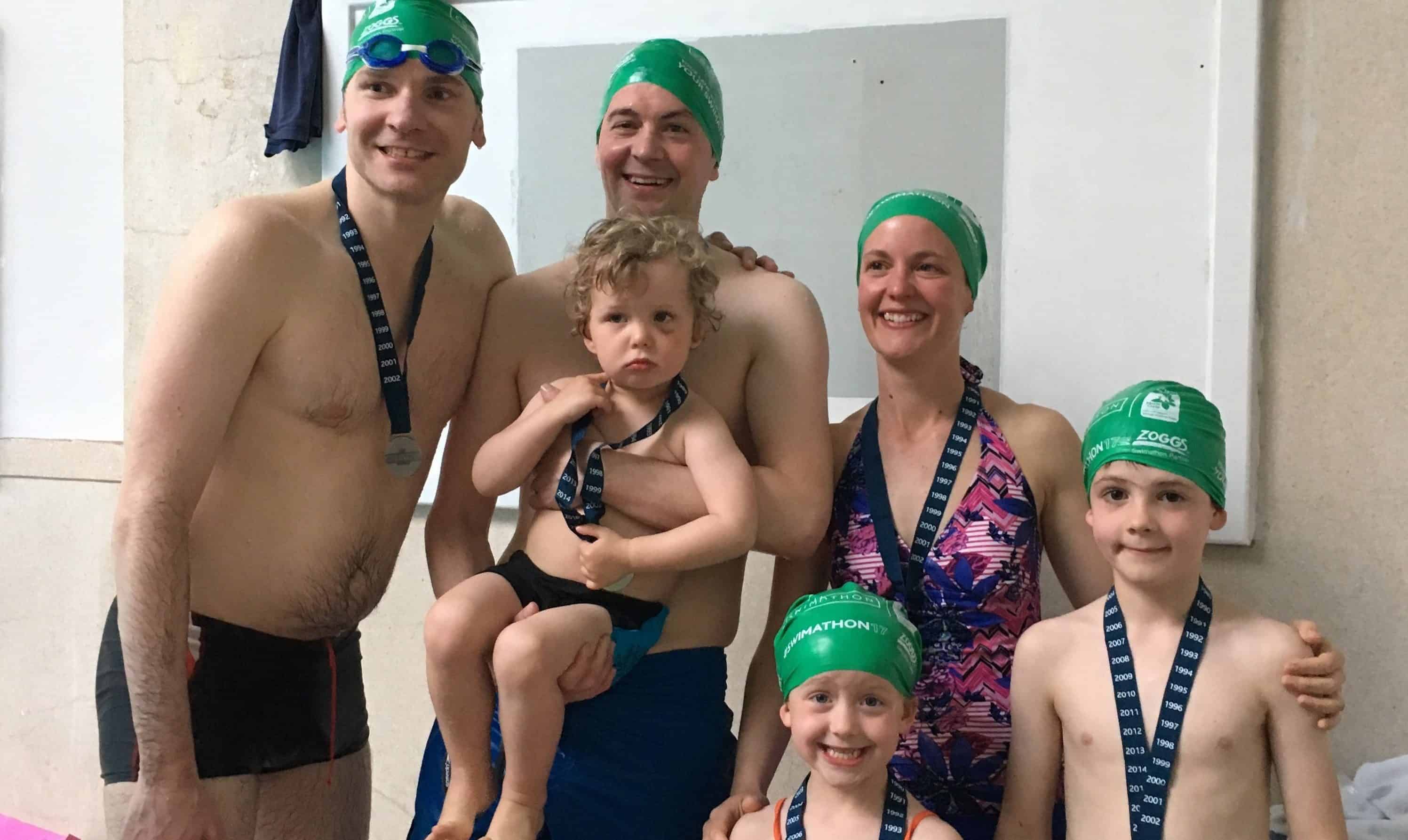 Swimmers celebrate the 
charity challenge.