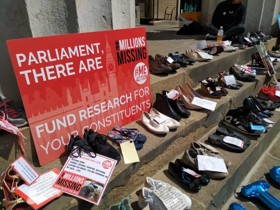 Shoes laid out on the church steps, representing people suffering from ME (c) ME Action UK