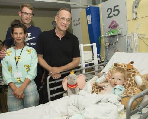 Tom Hanks, pictured with 16-month-old Roman, who is being treated at the hospital (Image: Evelina London Children's Hospital)