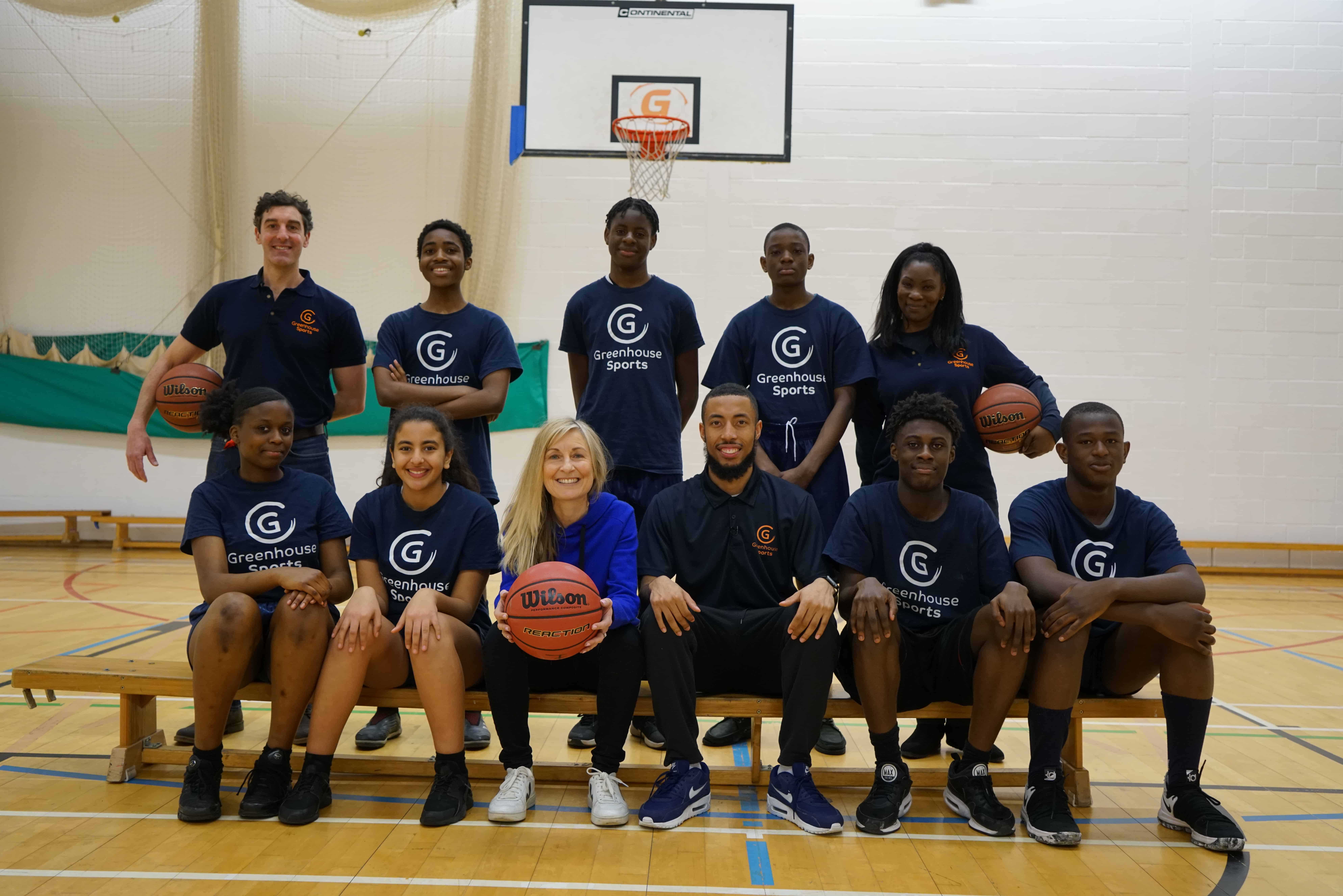 Fiona Philips with Harris Academy pupils and head coach, Jago Streete-Campbell