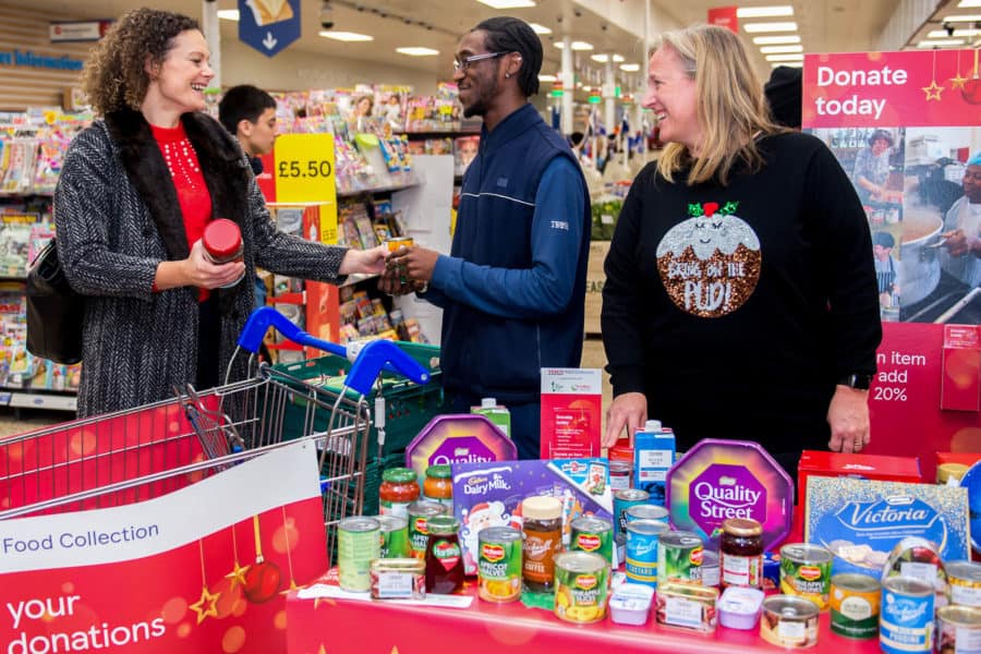 Emma Revie, chief executive of the Trussell Trust  joins volunteers at the launch of the Tesco Food Collection in the Surrey Quays Extra store last month.