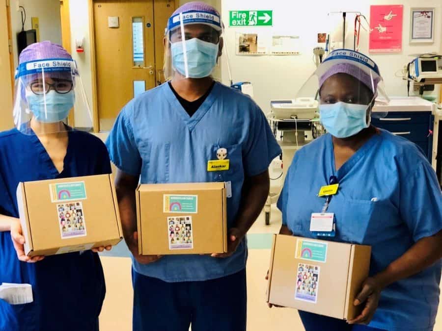 Staff receiving the NHS Wellness Boxes