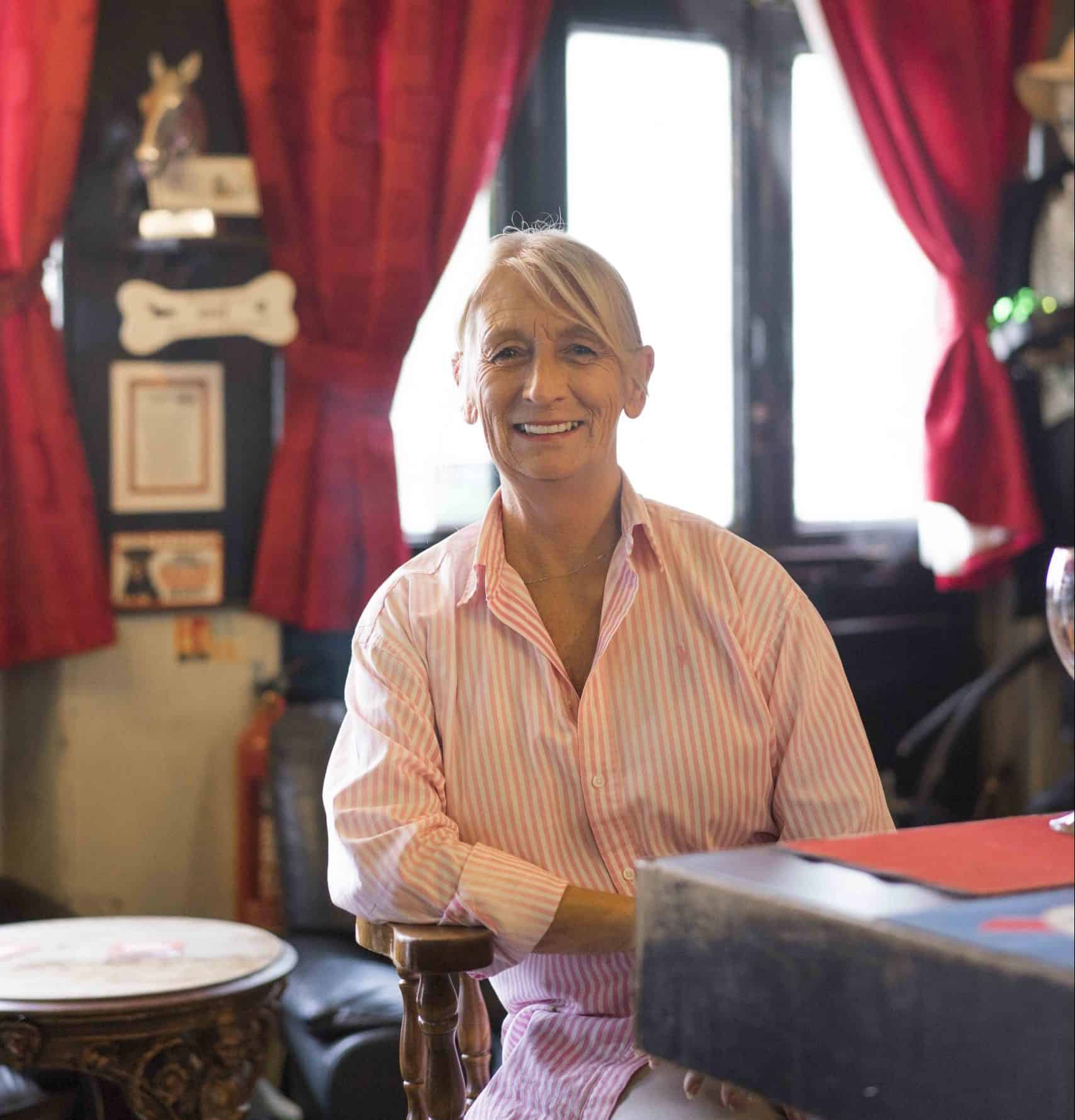 Julie, the landlady at the Nag's Head, pictured in July when the pub first opened after lockdown