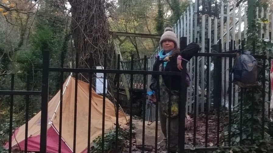 Campaigner Sue at the encampment by Cox's Walk Footbridge