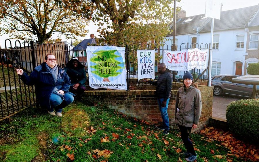 Campaigners put up signs in the estate's shared garden