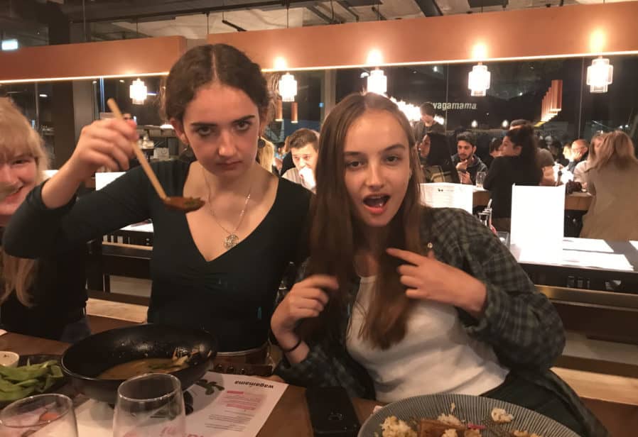 Ruby (right) with her friend Bronwen (left) before she became unwell, pictured at her favourite place to eat - Wagamama's.