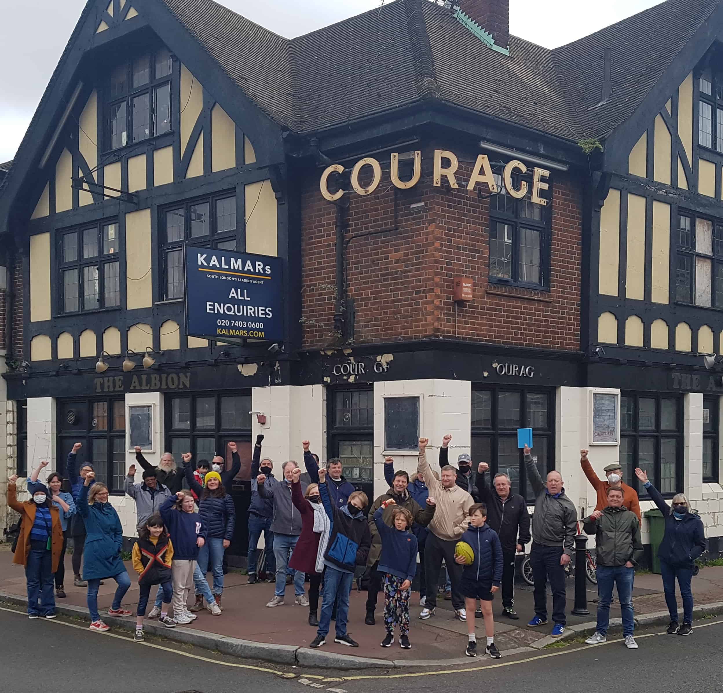 People outside The Albion former pub earlier this year