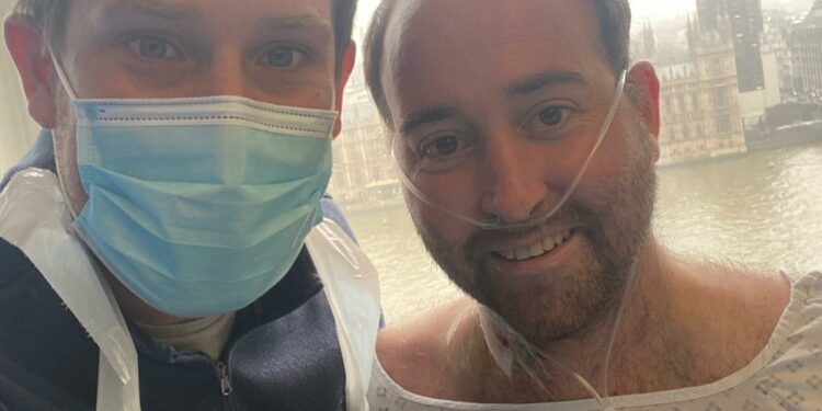 Brian Williams visited by friend Lloyd McMillan at St Thomas' Hospital