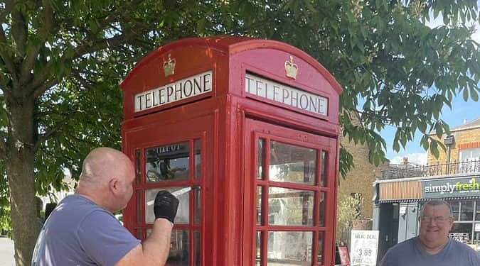 The phone box gets a makeover ahead of its big day.