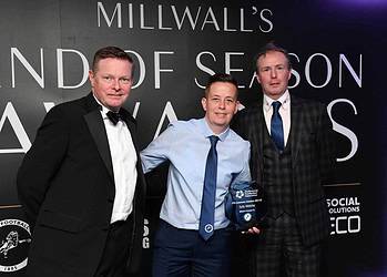 Kelly Webster with Millwall chief executive Steve Kavanagh and community trust boss Ian Daly (Photo: Brian Tonks)