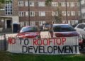 A banner against proposed rooftop homes on the Nunhead Estate