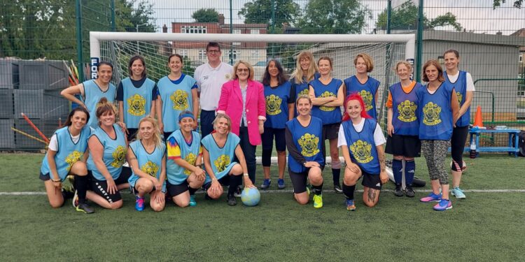 Athenlay Ladies FC, Cllr Rose wearing pink jacket (centre) and Paul Parker (left centre)