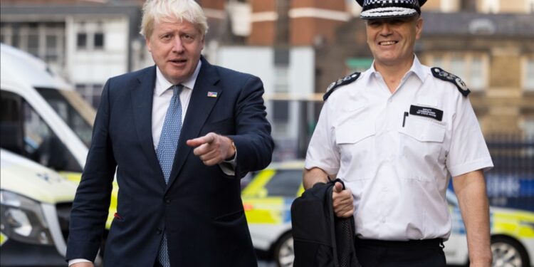 Prime Minister Boris Johnson and Acting Commissioner Sir Steve House