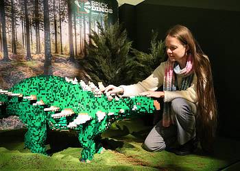 Emma Nicholls with the Polacanthus model. Credit: Horniman
