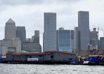 The new RNLI lifeboat station on its way to a permanent home under Tower Bridge (image: RNLI/Hallmark Broadcast)