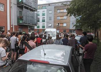 Protestors block the immigration van in Peckham