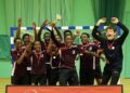 The St Thomas the Apostle handball squad celebrates their win
